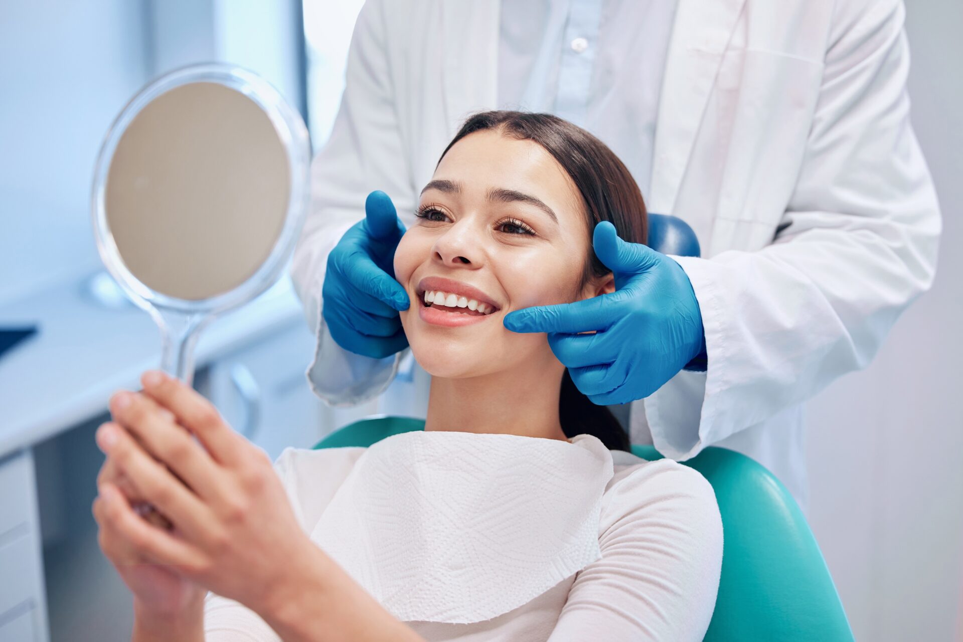 Woman looking at dental implants